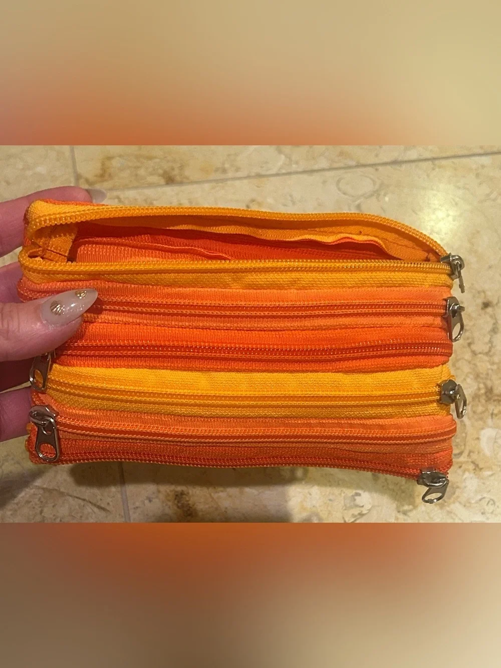 Striped Two Tone Orange 7 Zipper Pouch